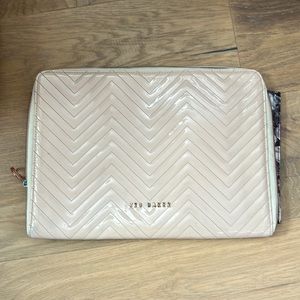 Ted baker laptop sleeve.